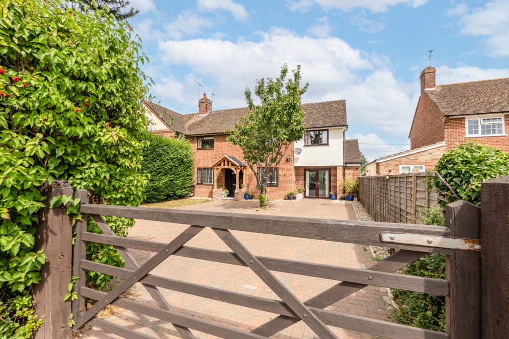 property exterior photo edited with blue skies 